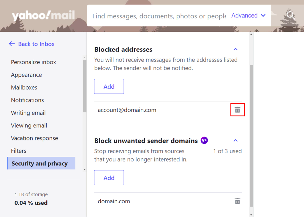 memilih ikon keranjang sampah untuk mengelola filter blokir email di yahoo